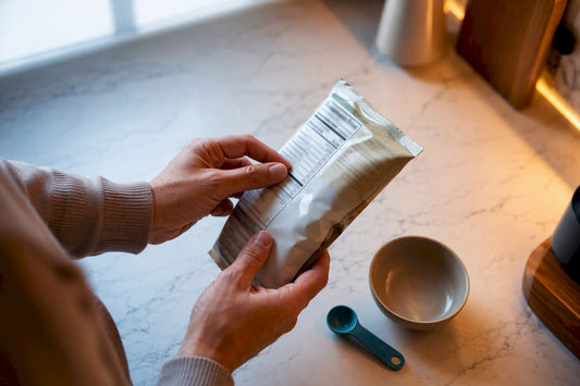 Hands checking a snack serving size
