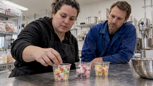 Team comparing freeze-dried candy samples